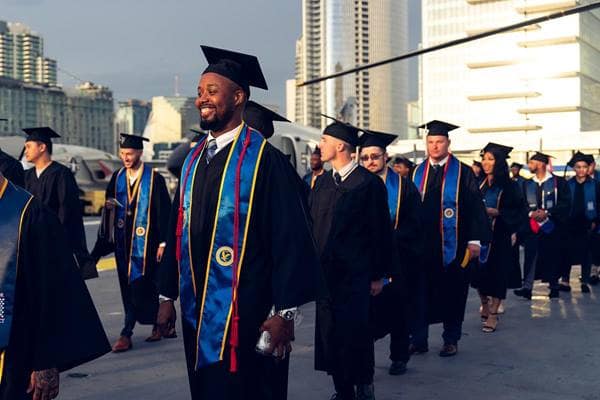 Embry-Riddle Worldwide’s online bachelor programs ranked among the nation’s top 15 in the 2025 U.S. News & World Report Best Online Programs rankings. Here, Worldwide students celebrate at a 2024 commencement ceremony held in San Diego, California.