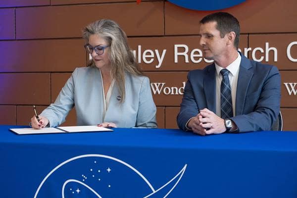 NASA’s Langley Research Center Acting Director Dr. Trina Marsh Dyal (left) and Dr. Jeremy Ernst, vice president for Research and Doctoral Programs at Embry-Riddle, complete the signing of a Space Act Agreement during a ceremony held at the facility in Hampton, Virginia.