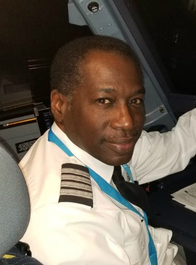 pilot Garfield McFarlane in the cockpit