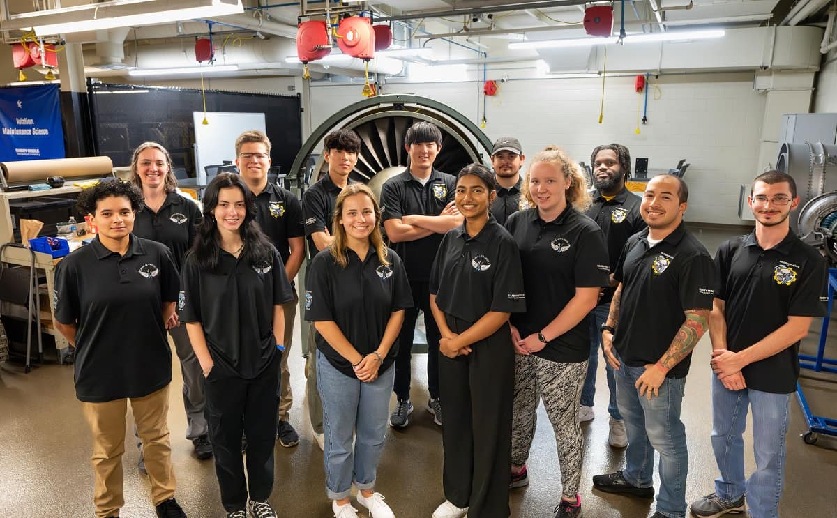 Two Embry-Riddle teams, including Tea Galon (far left) and Hannah Daren (front, third from left), competed in the 2023 Aerospace Maintenance Competition