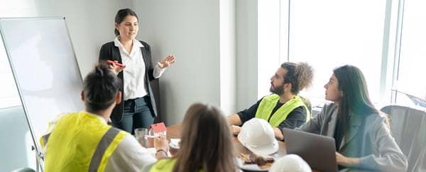Co-workers meet in a conference room