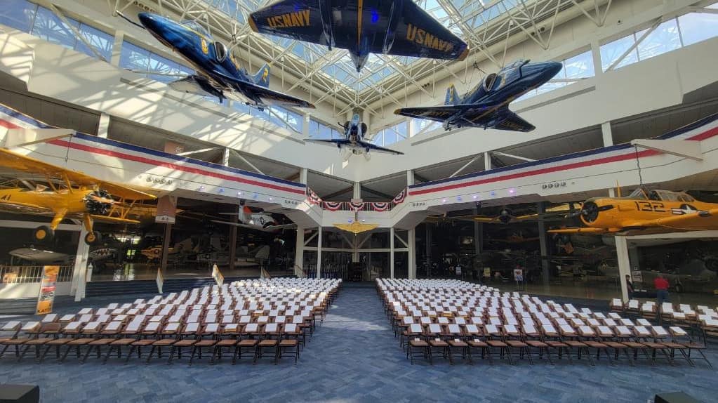 Inside of Pensacola museum setup for a graduation ceremony 