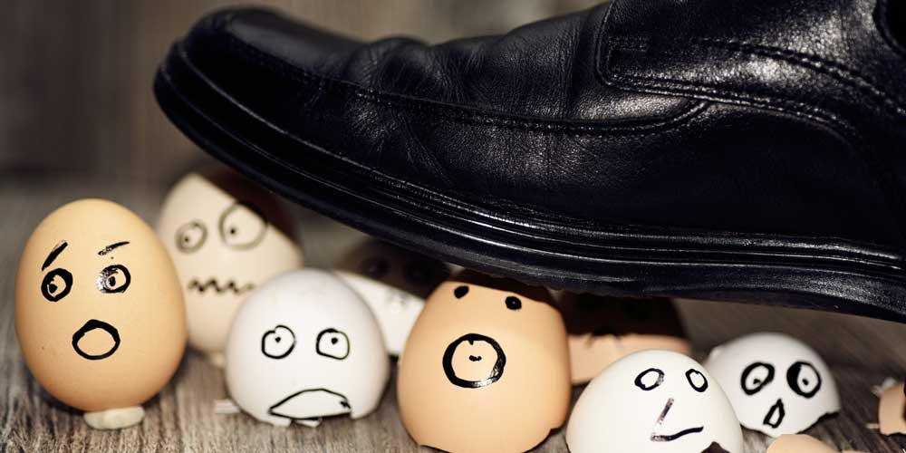 Foot crushing egg shells.