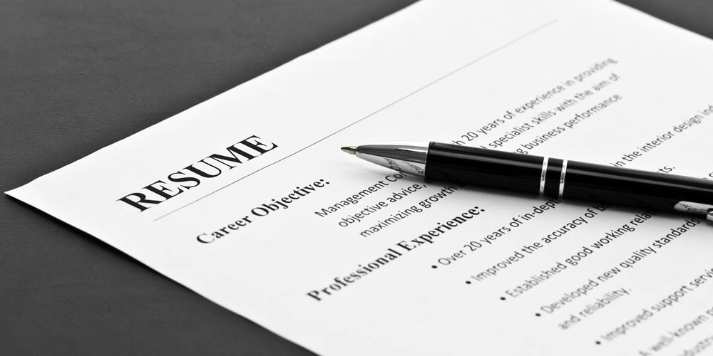 Pen laying on a resume.